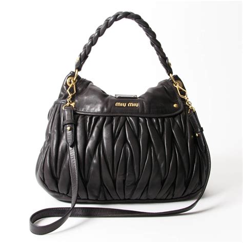 miu miu black coffer bag|miumiu clutch bag.